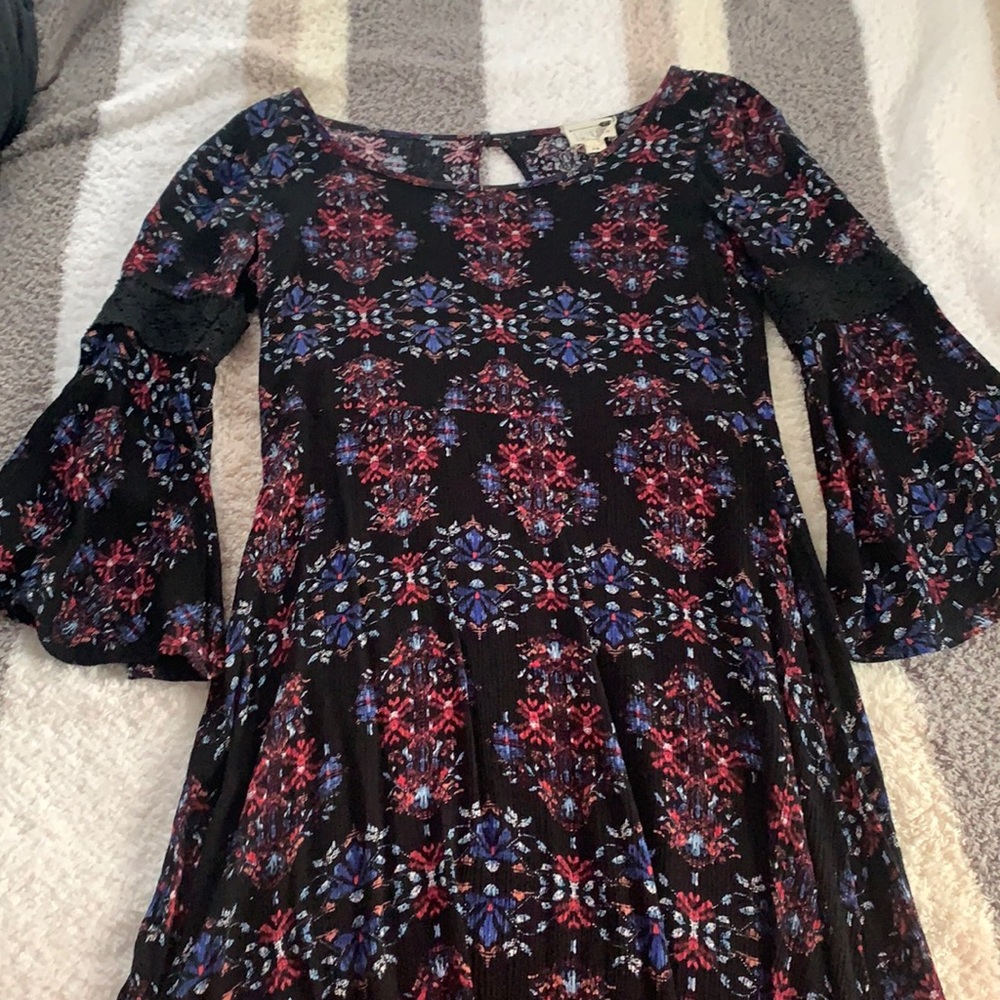 Black dress with pink and blue designs